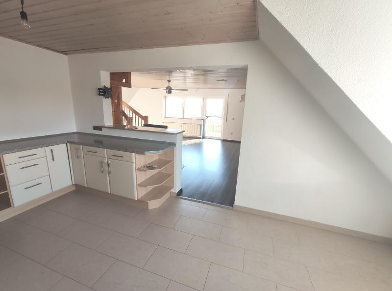 Whg. 1: Offene Küche mit Essbereich und Wohnzimmer Bild 2